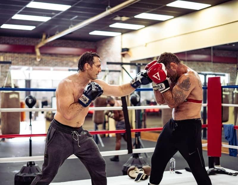 Two men boxing in the ring